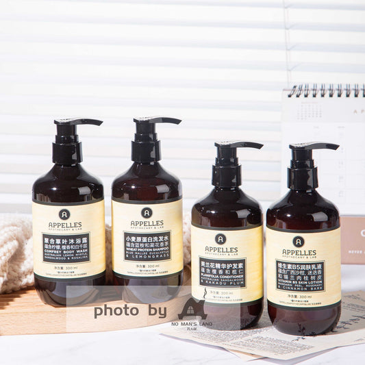 4 bottles of APPELLES hotel toiletries displayed on the tray.